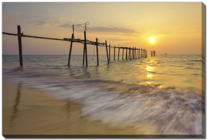 Sunset Over a Weathered Pier